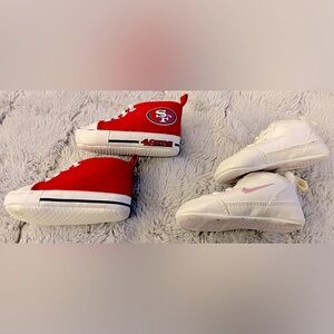 Baby shoes size 2. Red forty niners and white and pink Nikes